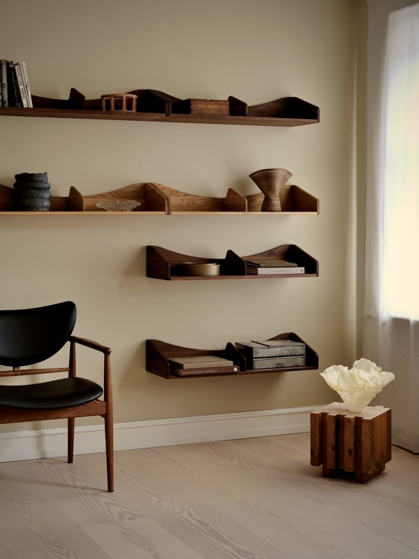 The Hulsø Shelf's organic silhouette becomes more pronounced when multiple shelves are arranged together in a formation.