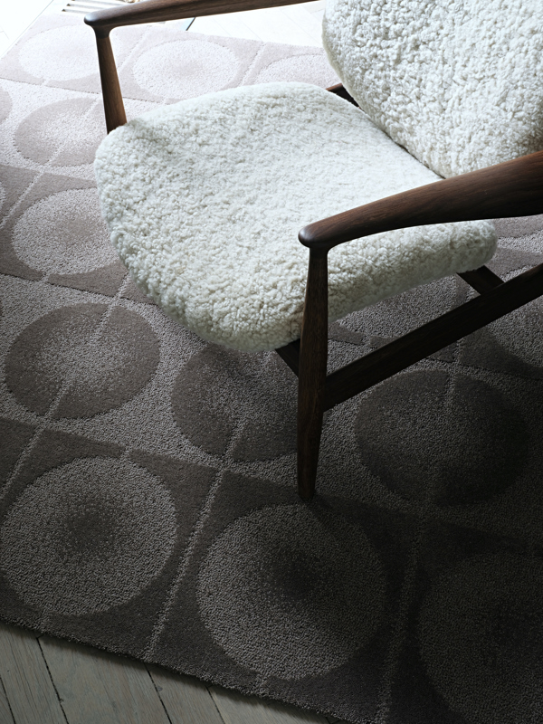 The Undyed Circle Rug in the colour 'Clay'.
