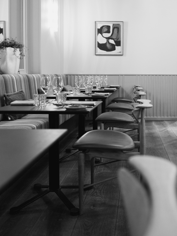 Reading Chairs in pure oak upholstered with leather.