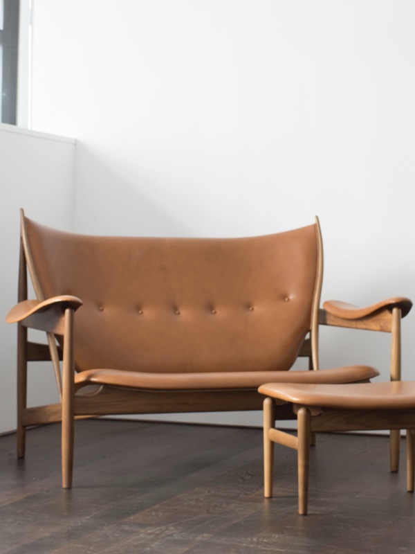 The Chieftain Sofa in walnut with 'Vegetal' upholstery in the colour '95'.