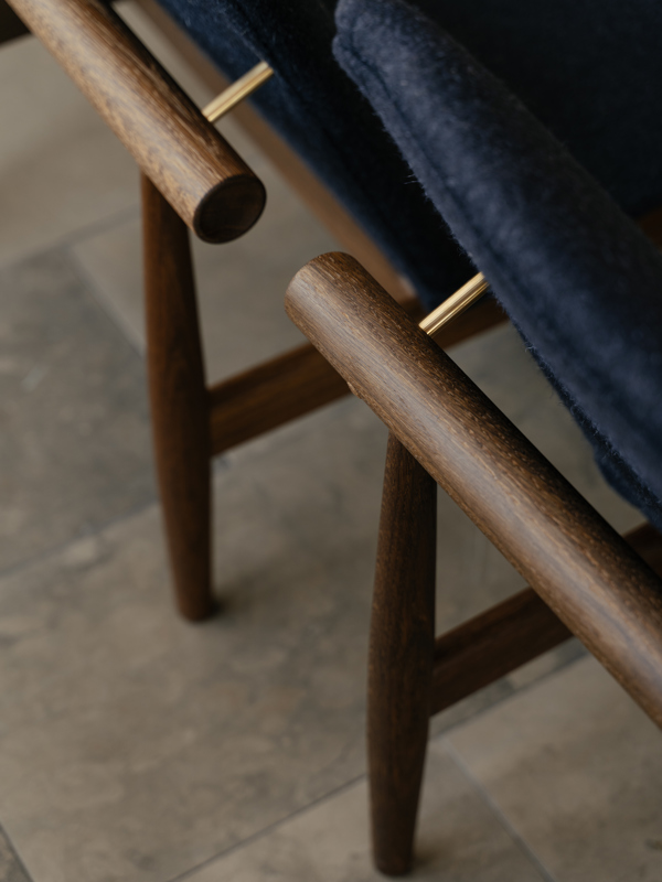 The Japan Chair in walnut with 'Blans' upholstery in the color '01-141'.