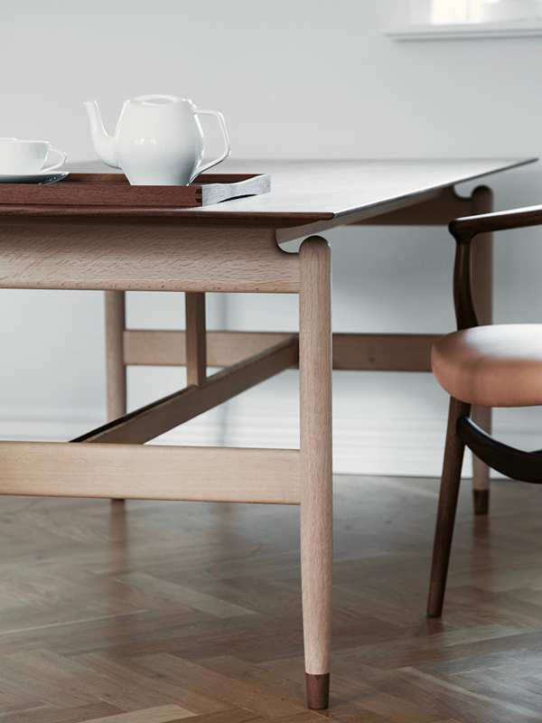 The Kaufmann Table in oak and walnut.