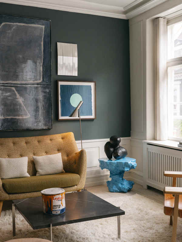 The Poet Sofa with oak legs upholstered with 'Safire' textile in the color '0016' on the backrest and 'Elle' textile in the color '950' on the seat.