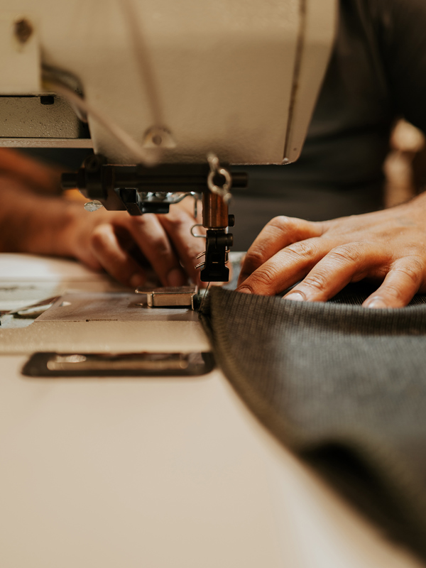  Precision in focus: Details captured in the intricacies of the sewing machine work.