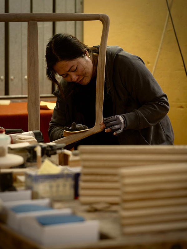 The frame for the Fireplace Chair is sanded at our furniture factory in Vejen, Denmark.