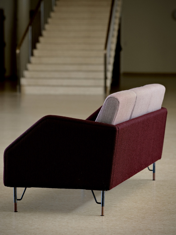 The 77 Sofa (three seater) with ‘Fuse’ textile in the colour ‘631’ on the seat and back cushions and ‘Helia’ textile in the colour ’693’ on the body.