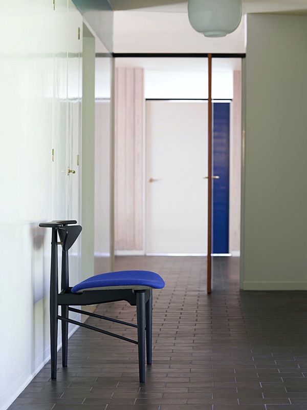 The Reading Chair in black painted oak with 'Watercolour' upholstery in the colour 'Blue Bonnet'.