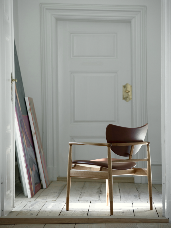 The 48 Chair in oak and walnut with 'Vegetal' leather upholstery in the colour '92'.